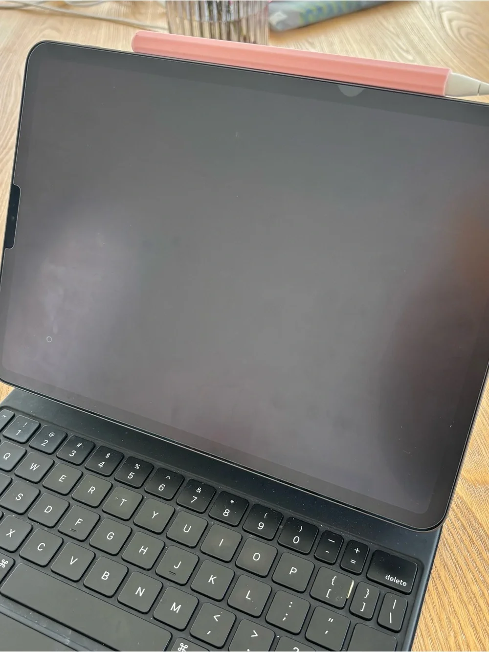 Apple iPad pro 2nd gen with Black Keyboard Case and Pink Apple Pencil